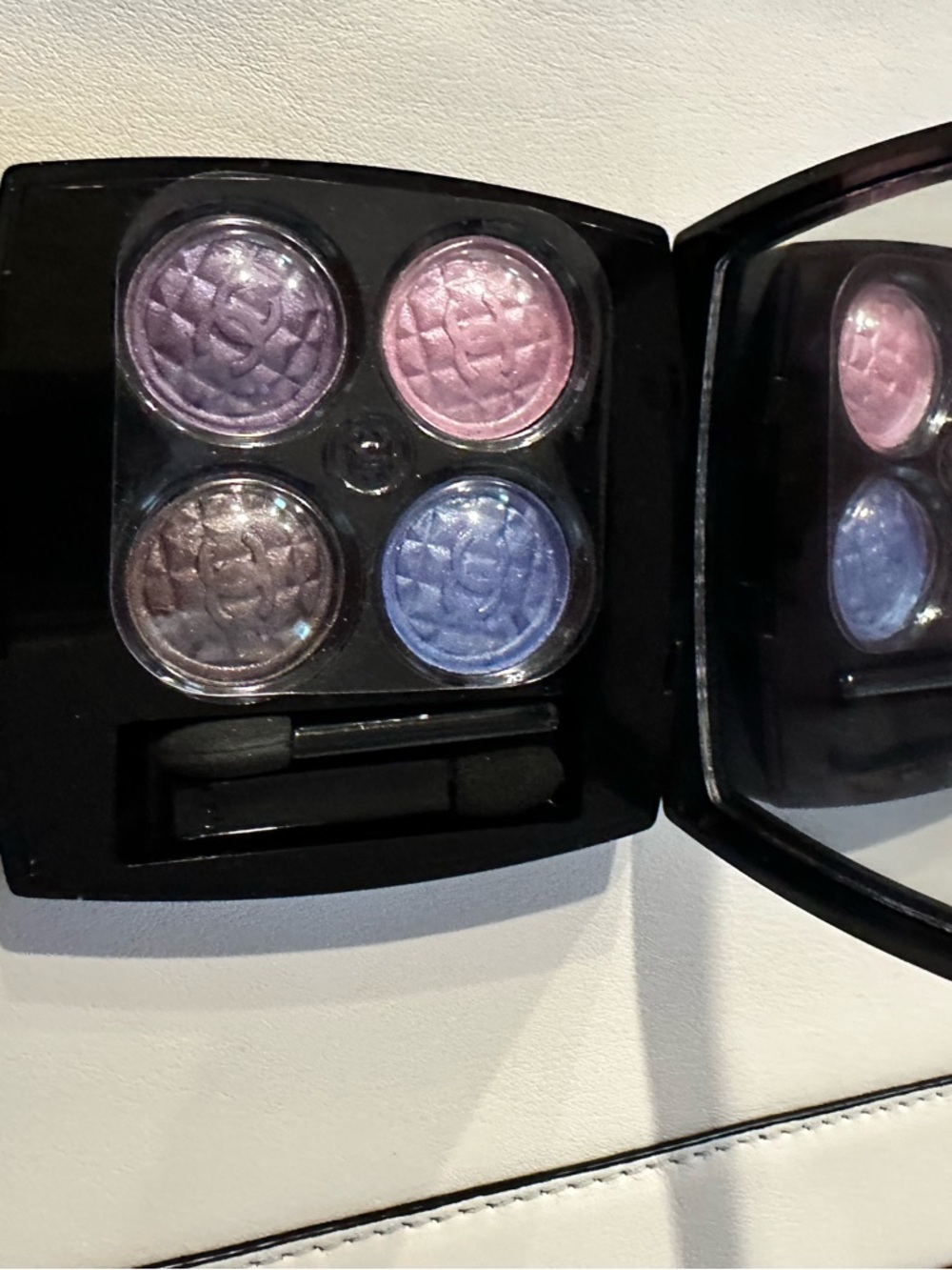 $75-CHANEL® 
CHANEL Four-Shade Eyeshadow Quad - Lavender, Pink, Silver, Blue